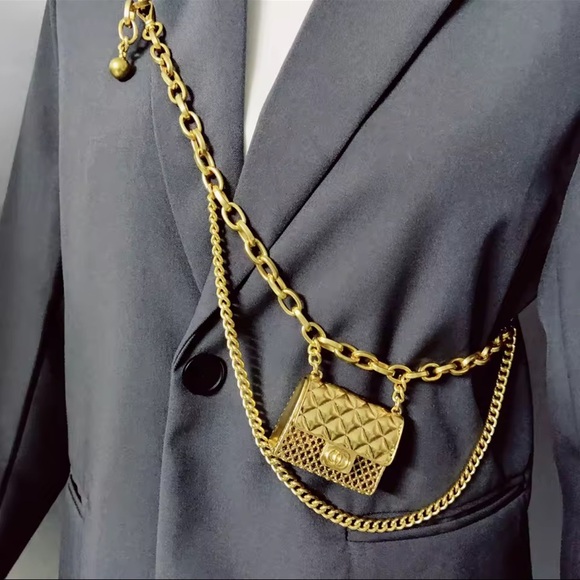 Anthropologie Accessories - Anthropologie Fashion Tassel Gold Chain Belt with mini Bag Trendy!
Mini Bag